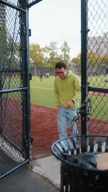 The gate — You're at the chain-link gate of the ball field, hand on the latch.